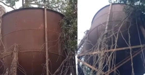 তিনতলা লোহার এই ট্যাংক কি শুধু জং ধরা এক কাঠামো?